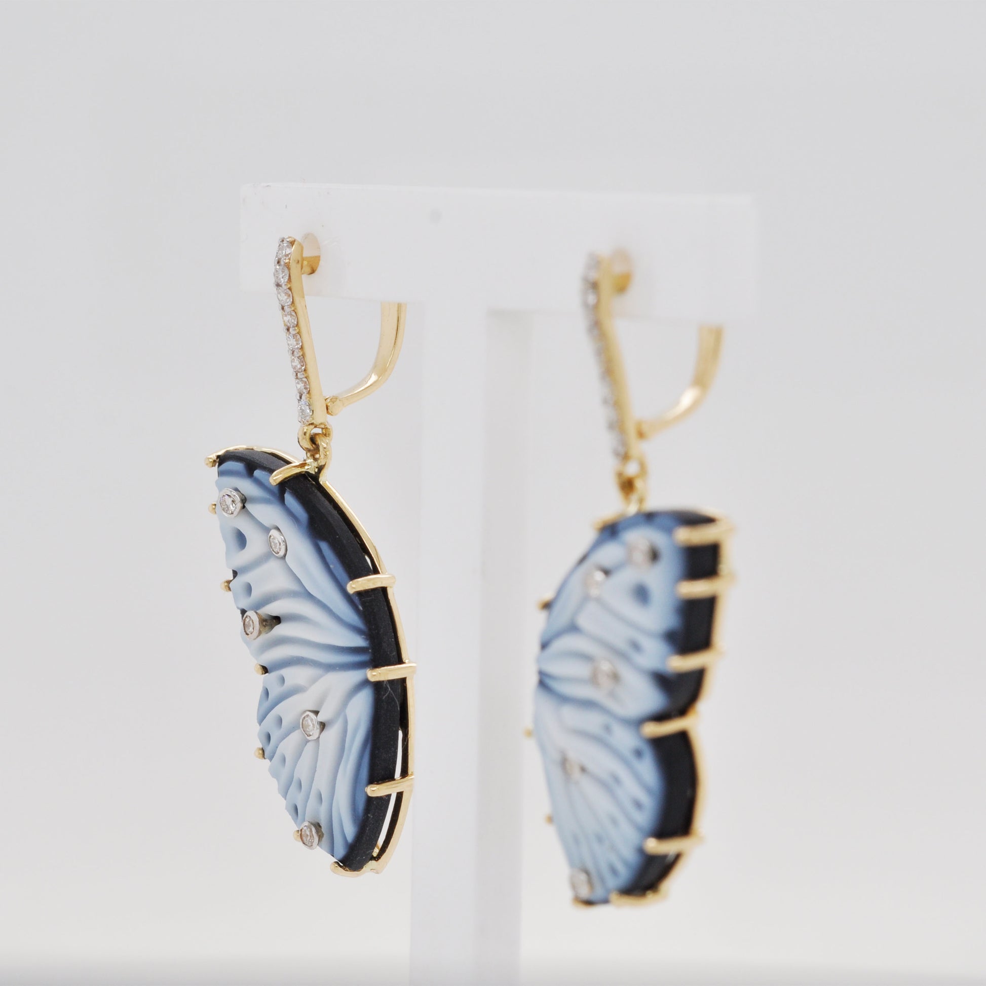 butterfly diamond earrings 
